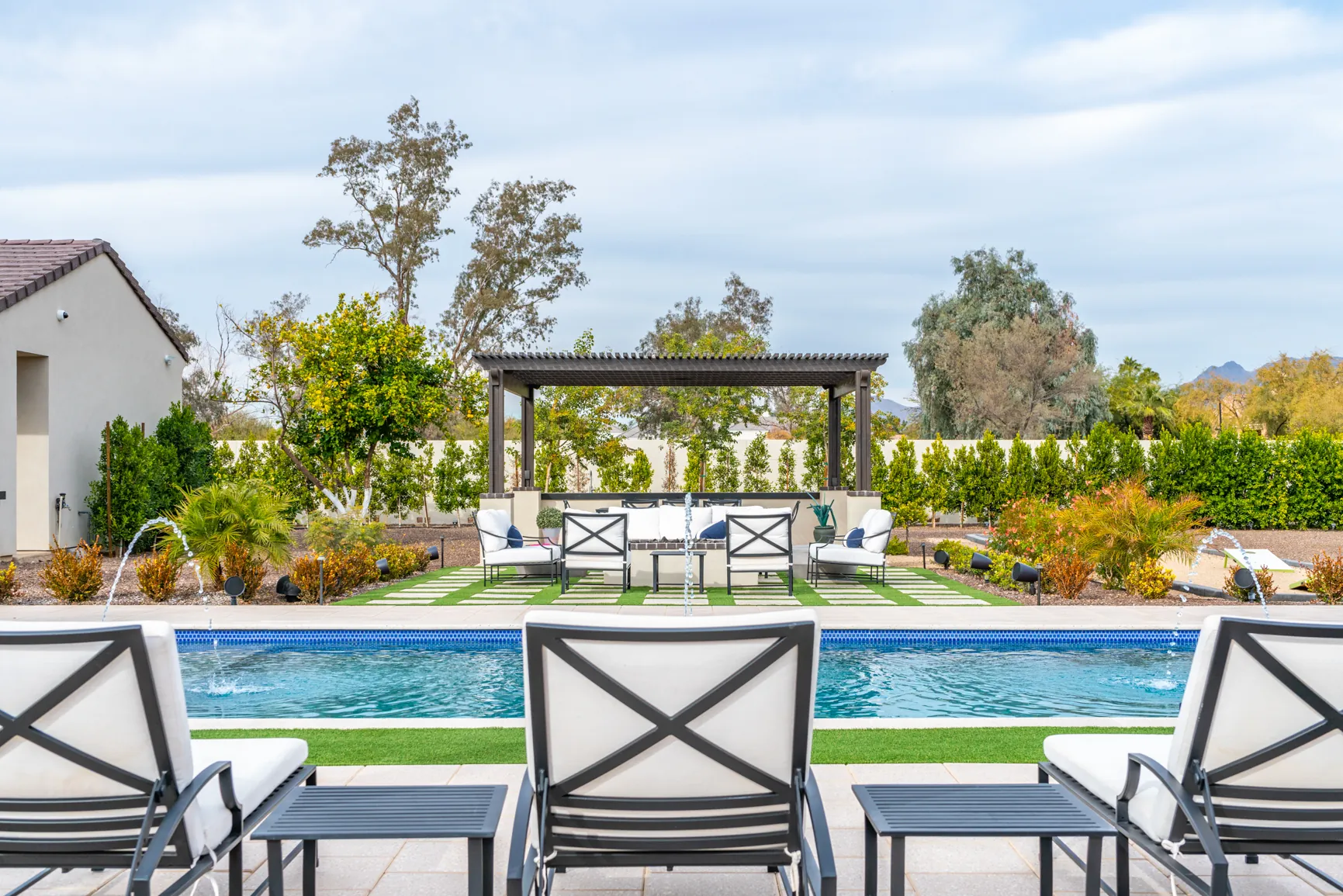 Backyard pool and patio photographed by SOLD